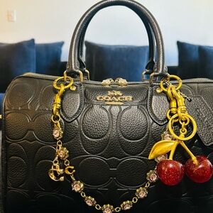Coach Black Leather Signature Satchel with Gold Hardware and Red Cherry Charm